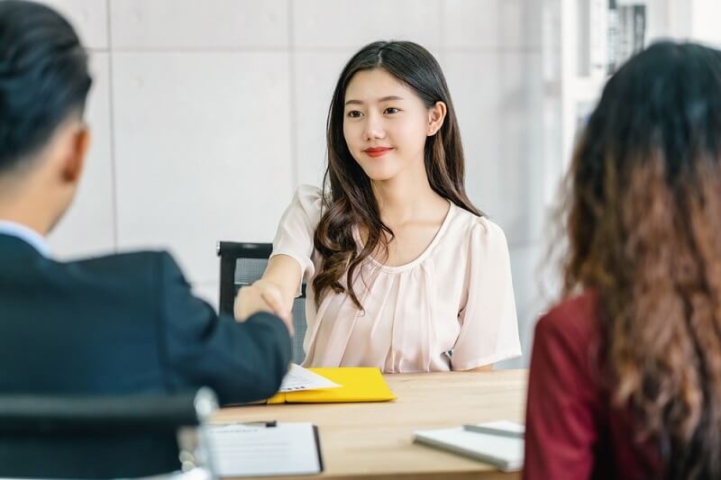 young asian girl in an interview with business management