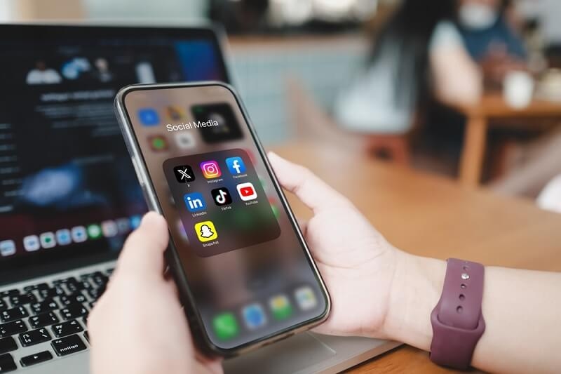 celeb looking at social media accounts