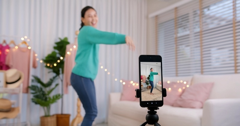 woman creating Reels on Instagram