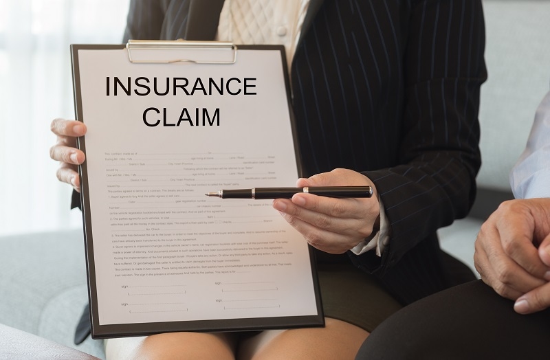 Claim Adjuster Negotiation Strategies showing by women in hand