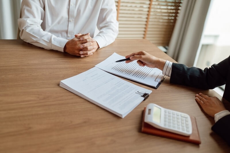 insurance agent explaining about health insurance terms