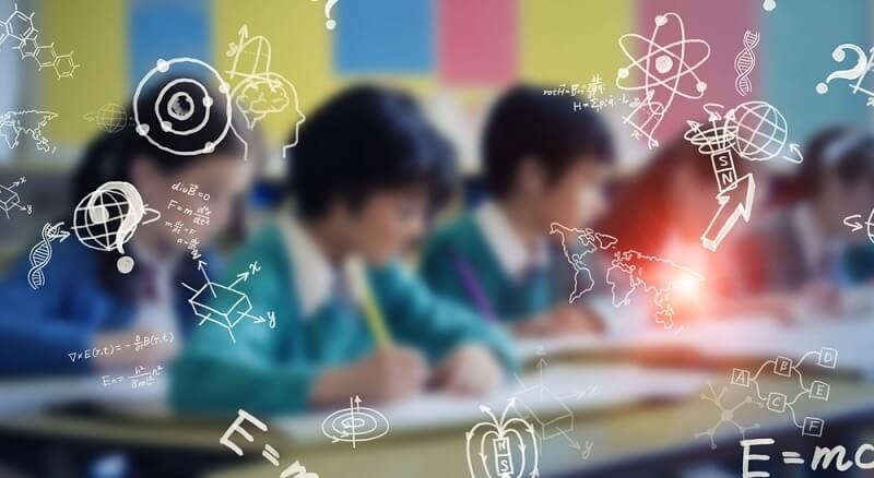 blurred picture of kids in digital classroom