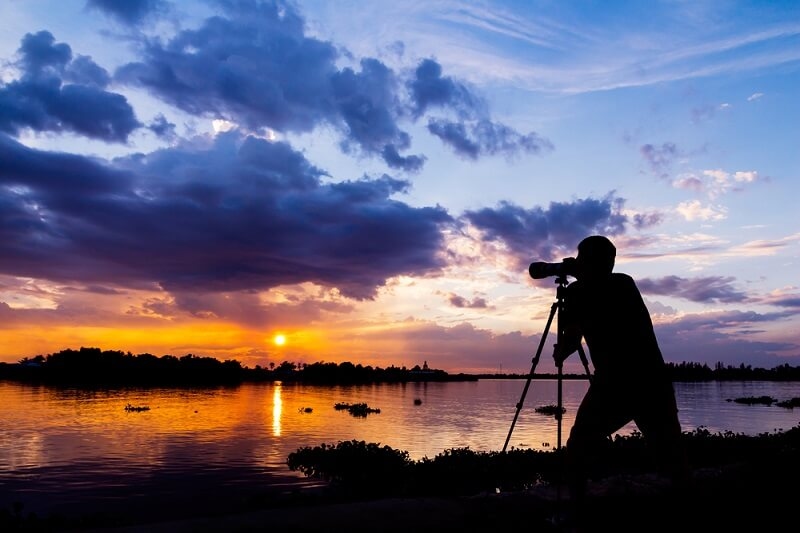 photographer clicking nature landscape picture