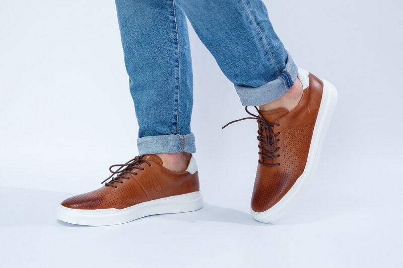 man wearing brown casual shoe