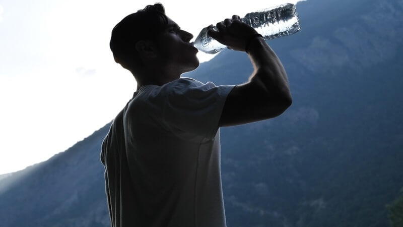 man-quenching-his-thirst-refreshing