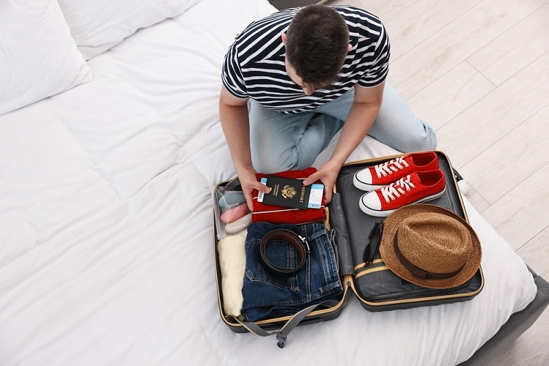 Man packing for travel