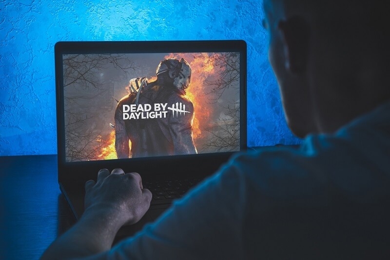 man watching horror movie