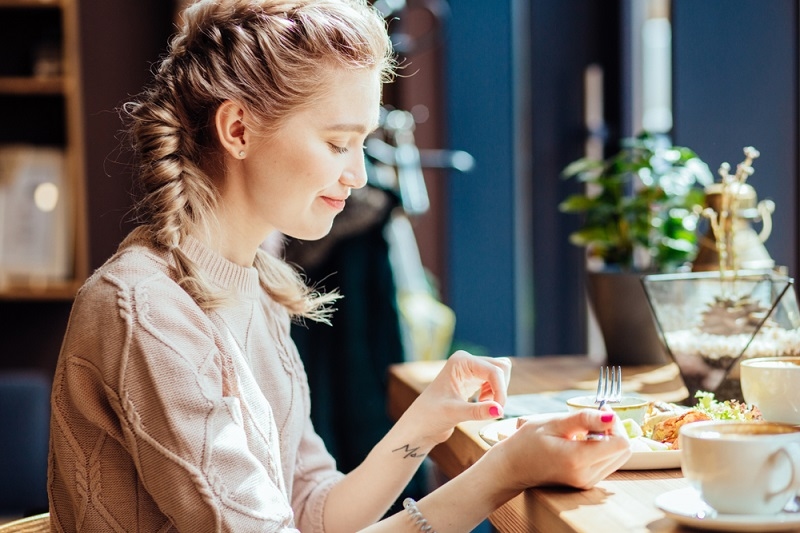 woman enjoying Mood Boosting food