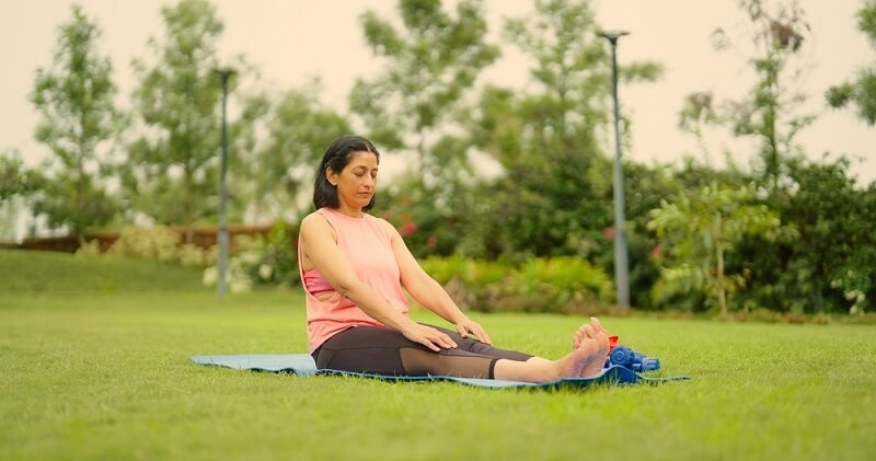 woman in open air doing meditation