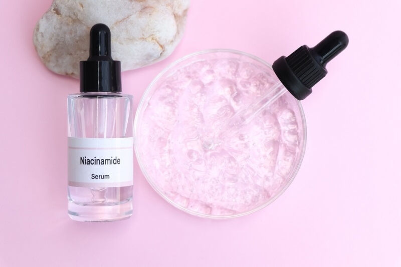 niacinamide face serum on table 