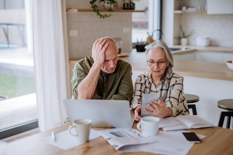 old couple getting stressed for retirement savings