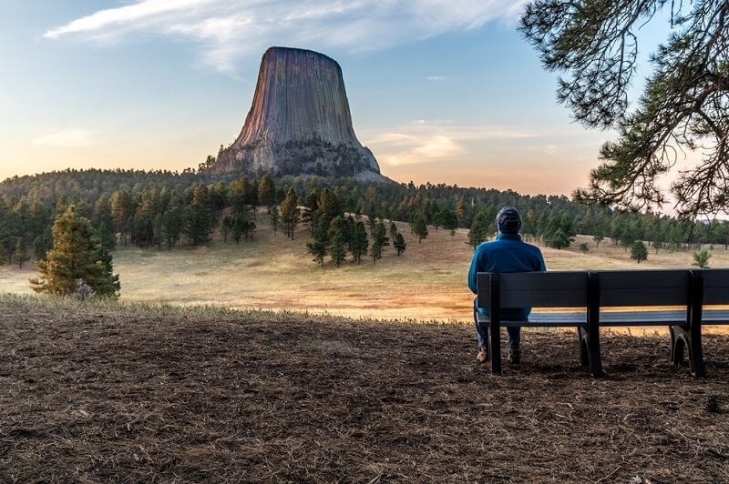 old man sitting and exploring wyoming