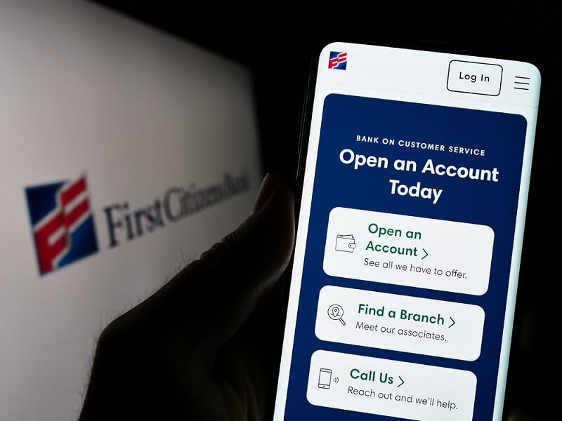 woman holding smartphone and trying to open a bank account online