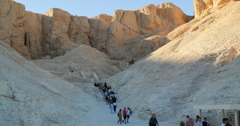 people visiting ancient burial sites