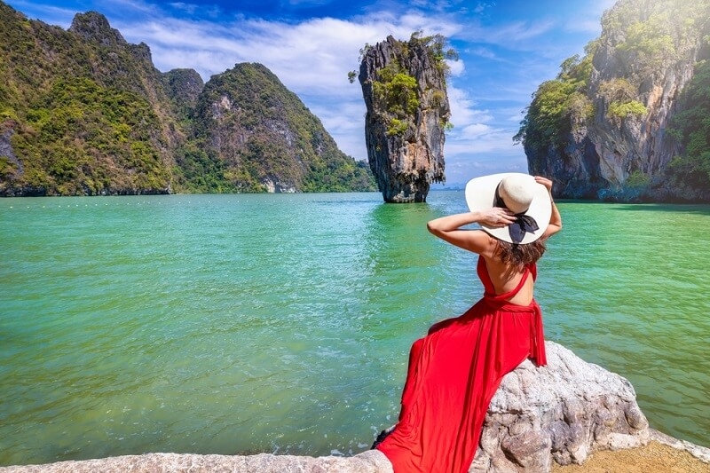 woman in red dress on phuket island