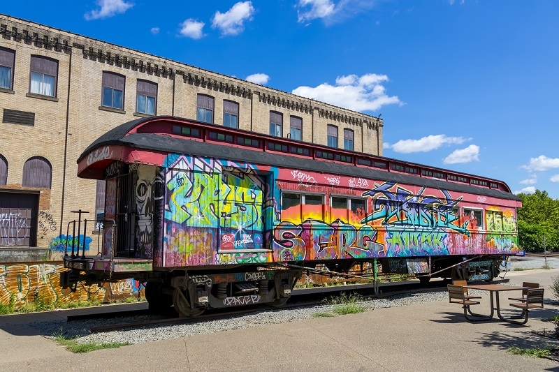  Colorful graffiti covered on a railway wagon in pittsburgh downtown.