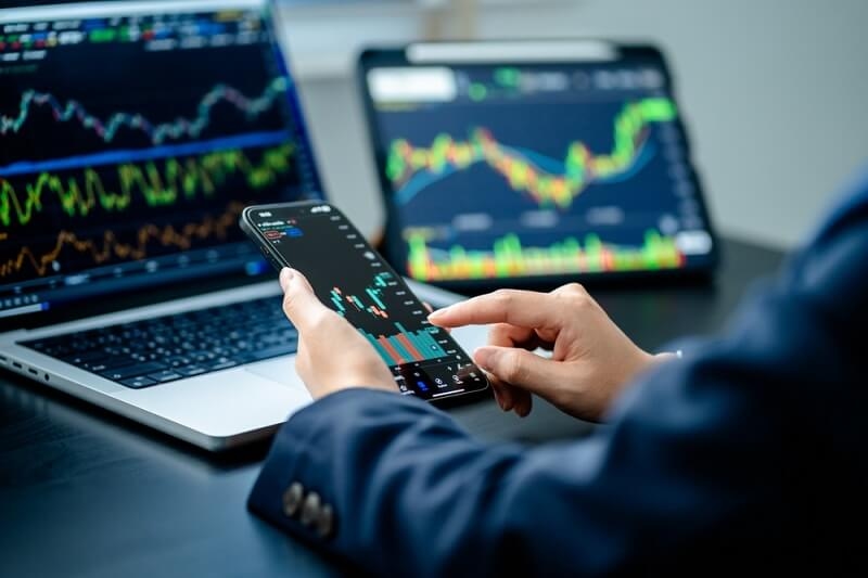 man tracking his stocks portfolio 
