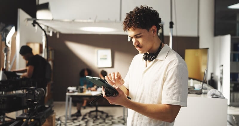 content producer working on tablet 