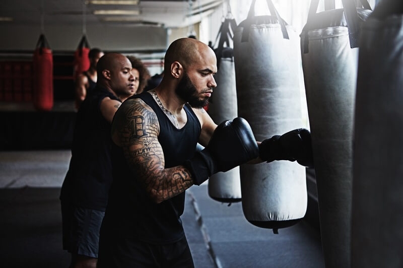 boxers punching on bags to improve punch power