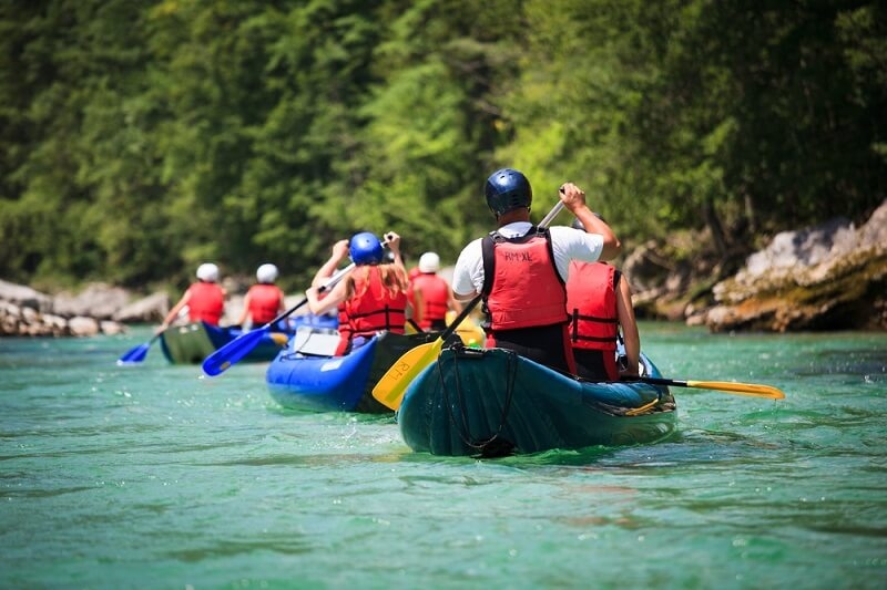 solo divers at river rafting practice