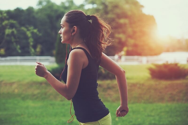 woman running in evening time 