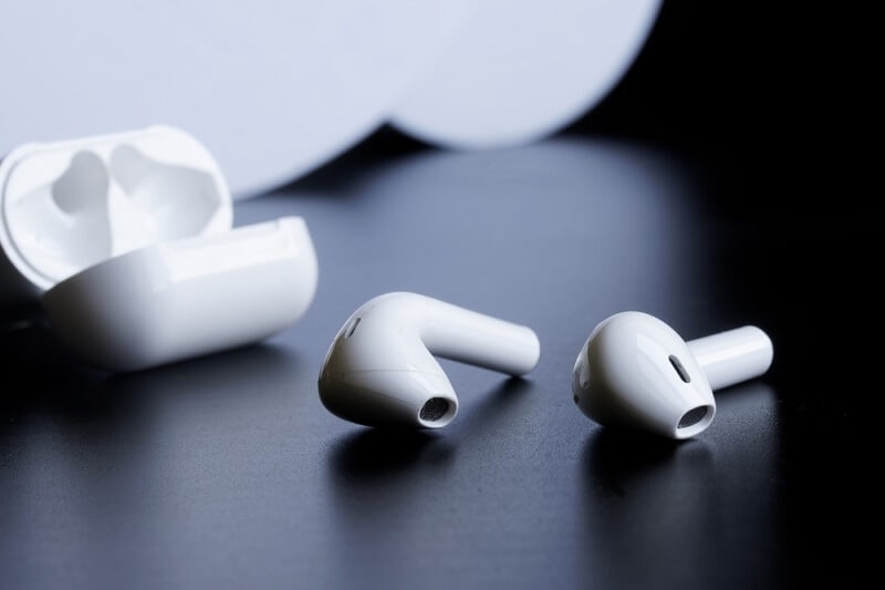 small ear buds with charging case