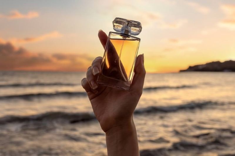 perfume bottle with sunset view