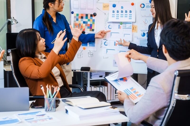 employees discussing on market tactics