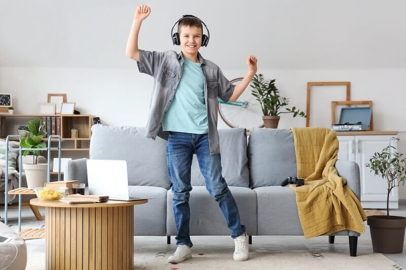 teen boy dances on beat