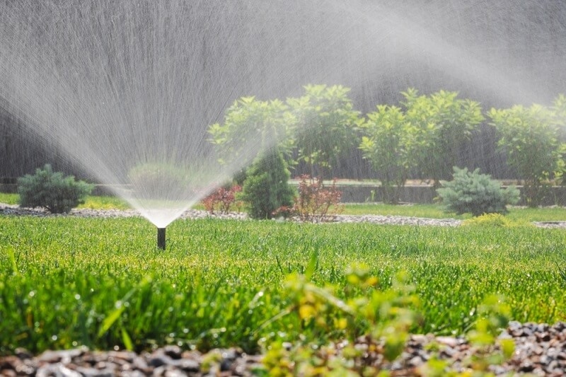 water sprinklers at lawn 