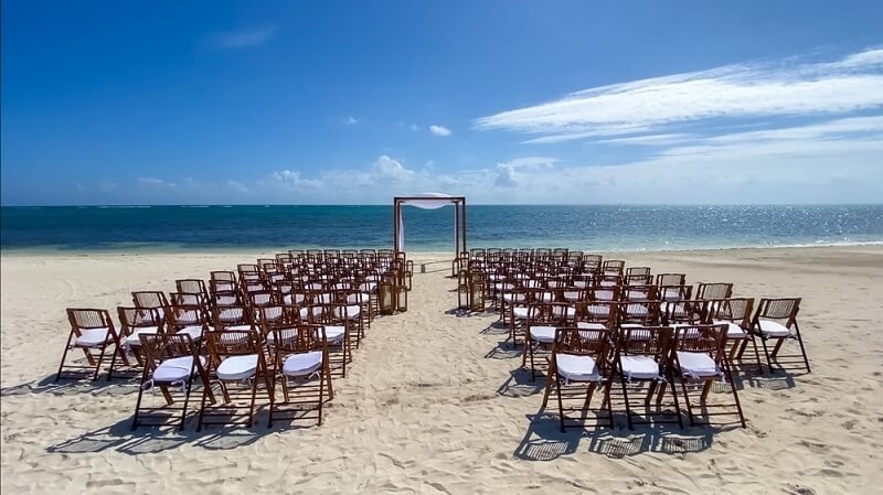 wedding destination near by ocean with chairs for guests