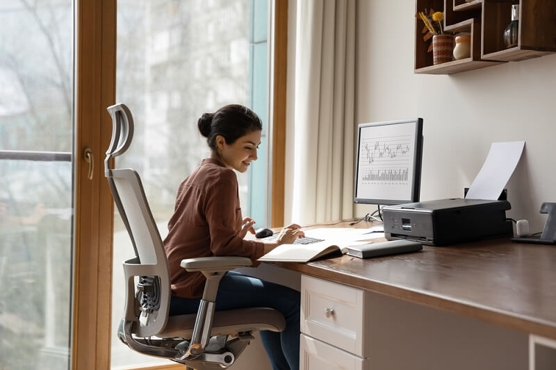 woman sitting at office chair