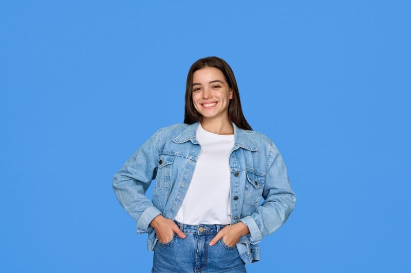 beautiful woman layering denim jackets fashion