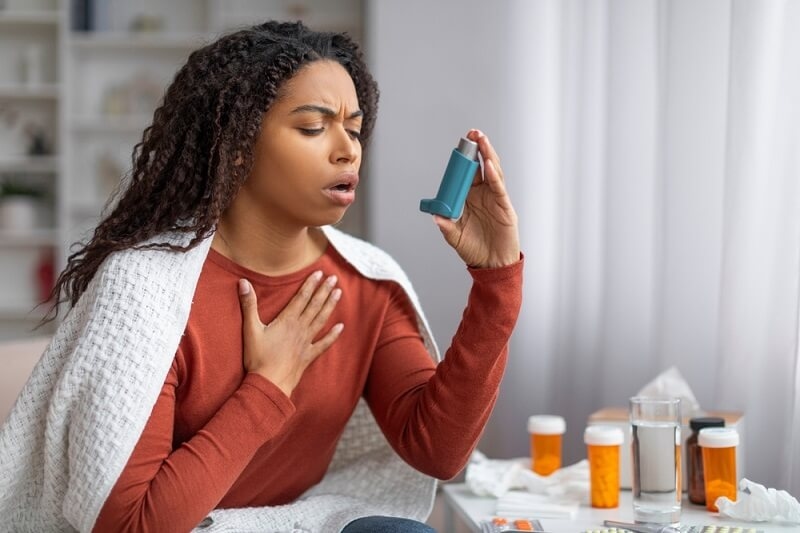 woman suffering from chronic disease taking medication