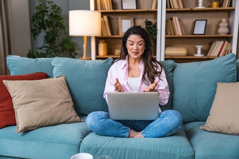 successful woman working on laptop