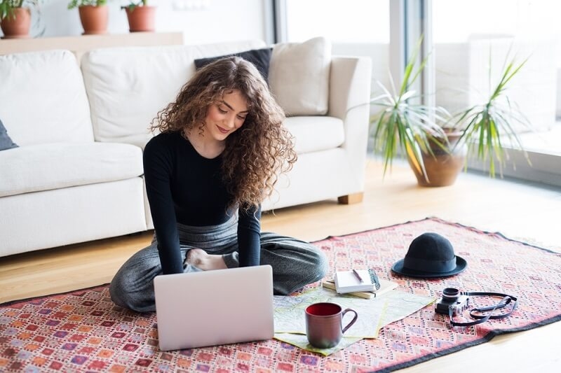 woman solo traveler at hotel room