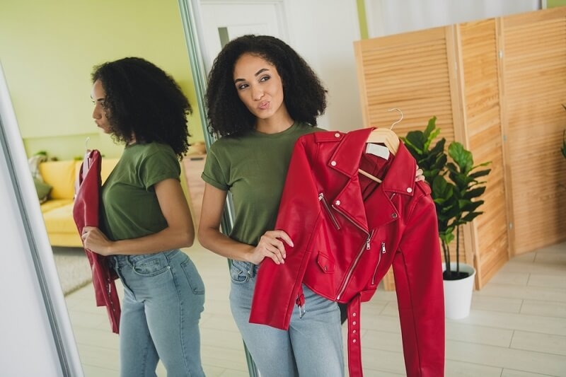 woman selecting stuff from wardrobe
