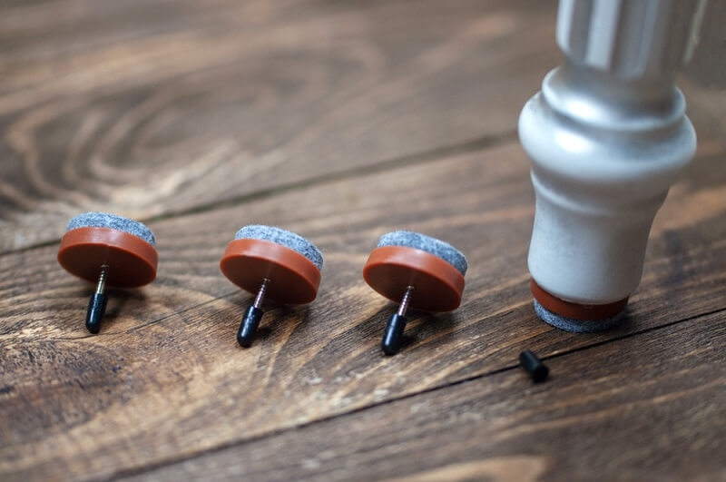 adding nuts to the bottom of furniture