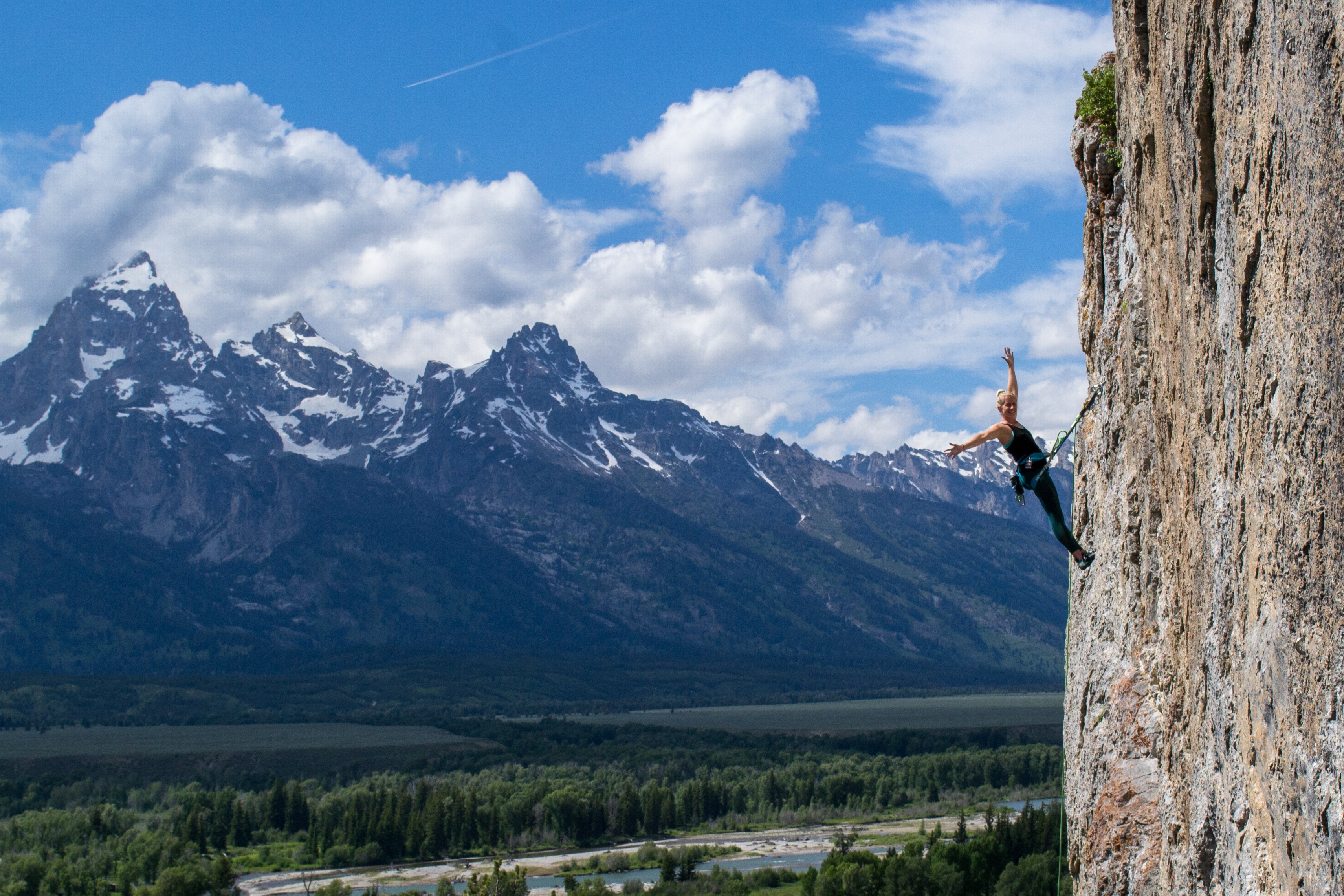 Girl rock climbing at Grand Teton National Park
