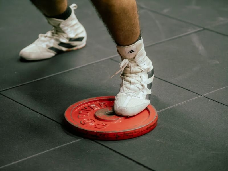 athlete performing footwork drills while training for boxing