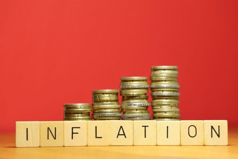 Idealised shot symbolizing inflation and lack of currency stability by decreasing coin stacks