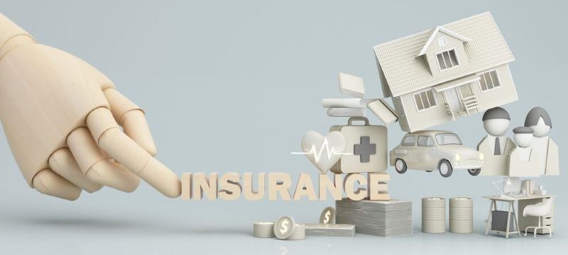 Insurance concept with all assets miniatures