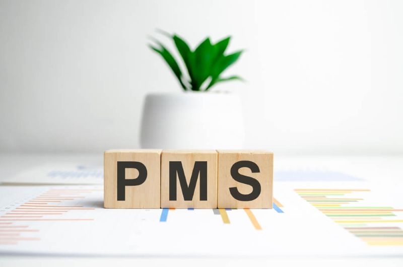 Text PMS printed on wooden cubes