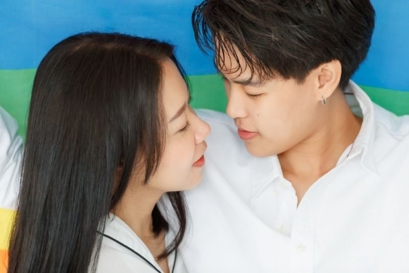 Two people gazing at each other affectionately in a close relationship.