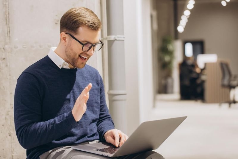 employee working remotely on a laptop