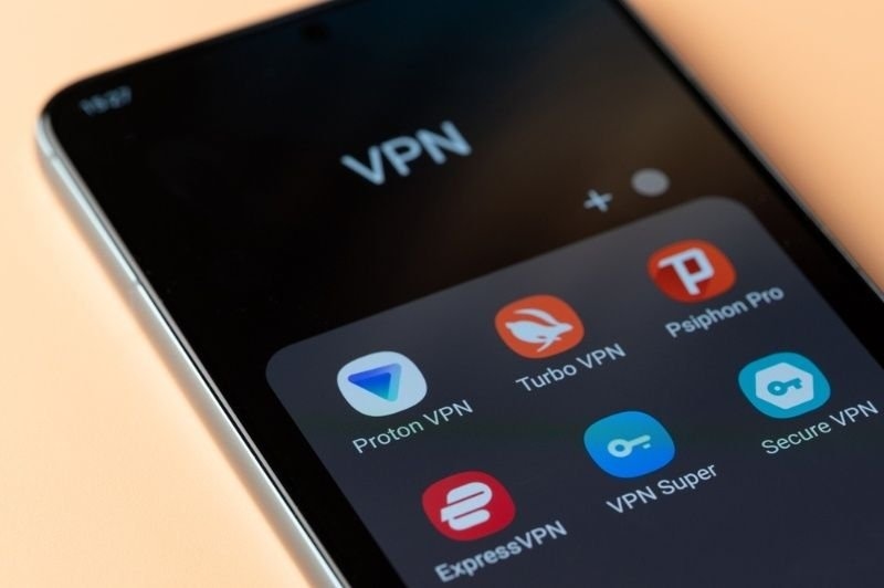 Smartphone screen displaying VPN applications including Proton VPN, Turbo VPN, ExpressVPN, and Secure VPN.