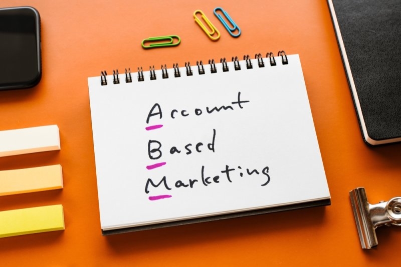 Notebook displaying “Account Based Marketing” on an office desk.