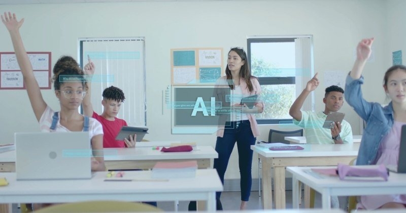 Teacher standing in a classroom with students raising their hands and using digital devices, with an AI interface overlay representing artificial intelligence in education.