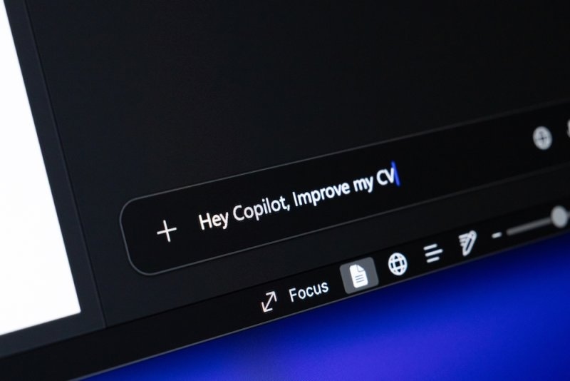 Computer screen displaying a prompt that reads “Hey Copilot, Improve my CV,” representing AI-assisted resume writing.