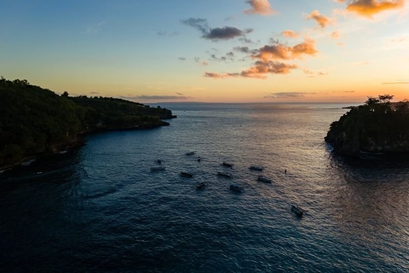 Crystal Bay coastline and ocean at dusk in Bali, Indonesia